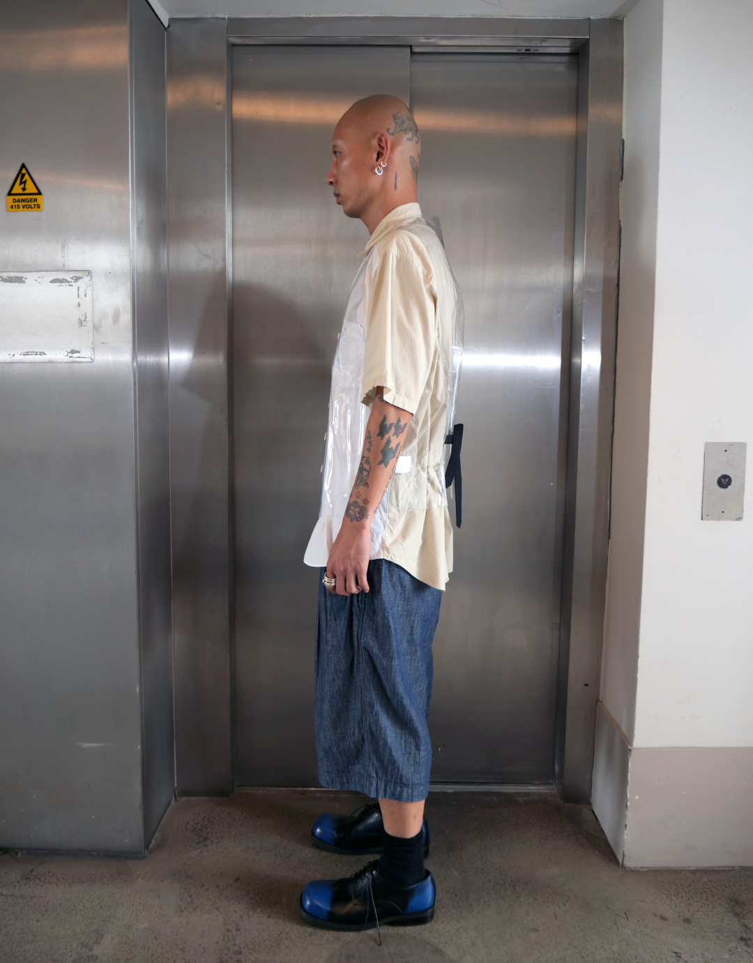 Transparent Plastic Button Down Vest